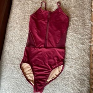 Woman’s burgundy leotard in size small